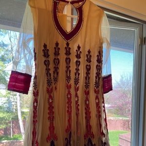 Beige/cream anarkali Kurta with churidhar.